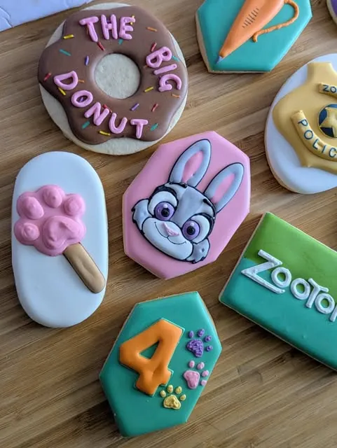 Zootopia themed fourth birthday cookies with Judy Hopps and a big donut