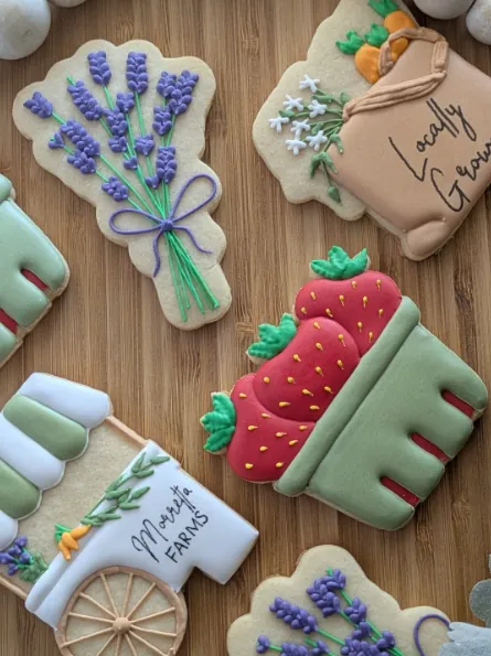 Garden cookies with lavender bouquets and strawberry baskets